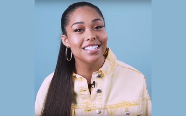 Jordyn Woods (2) wearing yellow shirt