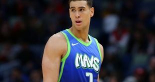 Dwight Powell wearing blue uniform